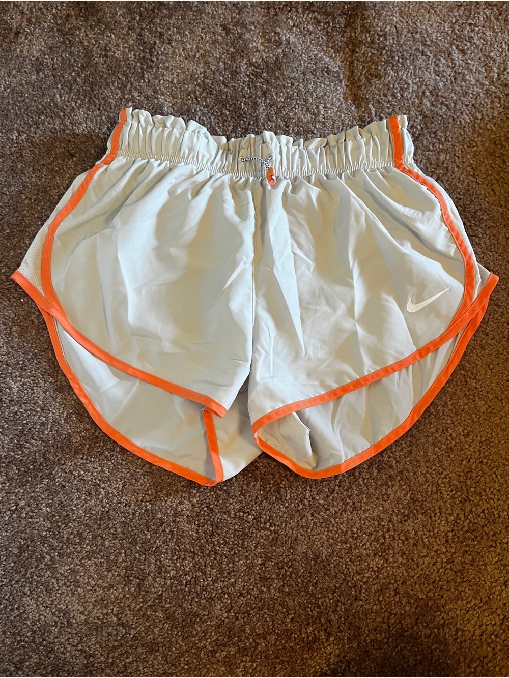 Nike Women’s White Athletic Shorts with Orange Trim